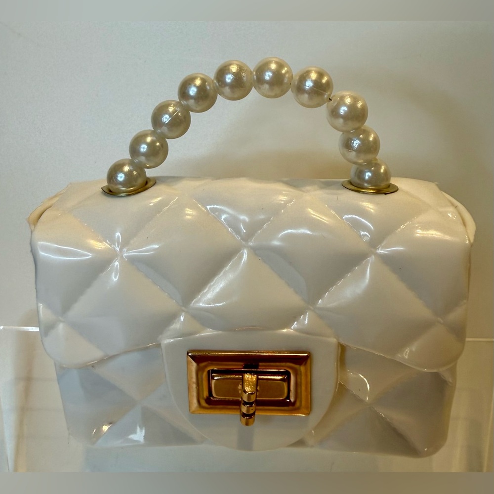 Elegant Cream Quilted Handbag